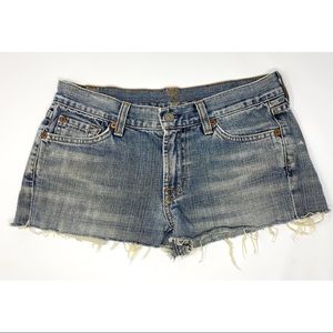 guy in cut off jean shorts